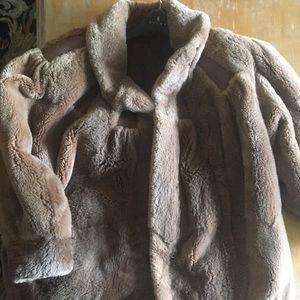 Brown fur with leather panels